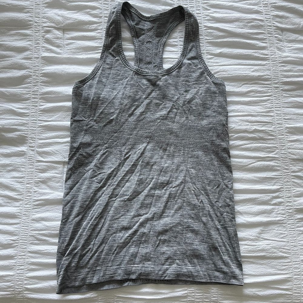 Very Good used condition Swiftly Tech Racerback Size 6